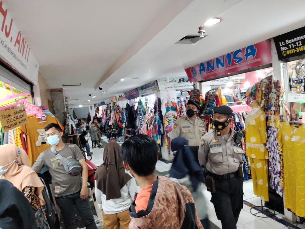 Polres Pelabuhan Makassar Ajak Warga Patuhi Prokes dan Bersatu Lawan Covid -19