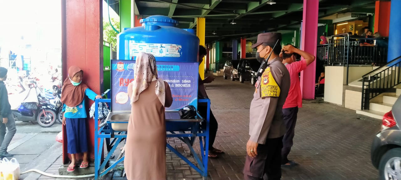 Awasi Protokol Kesehatan, Bhabinkamtibmas Butung Blusukan dipasar Pusat Grosir