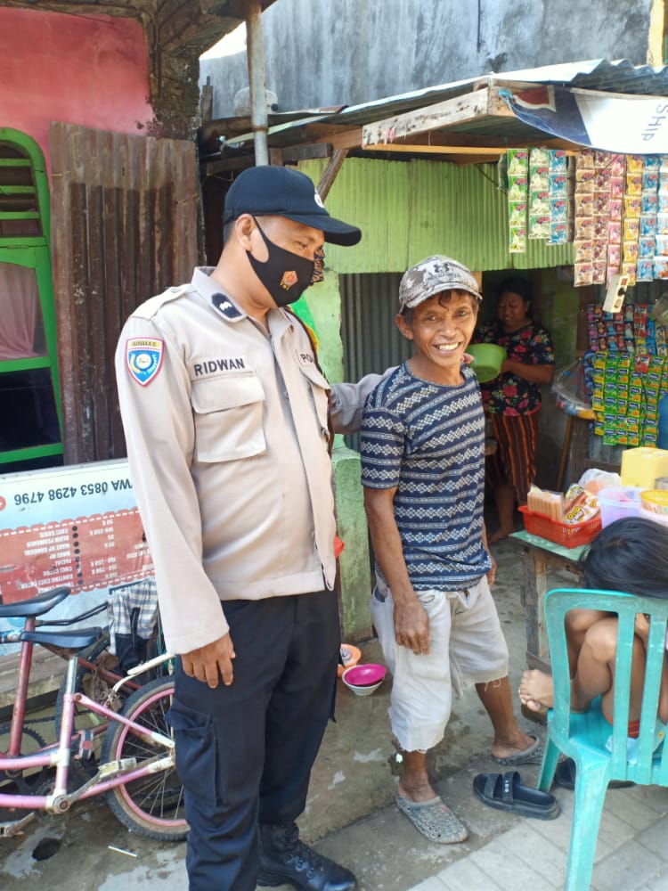 Bhabinkamtibmas Camba Berua Sambangi Warganya Imbau Prokes