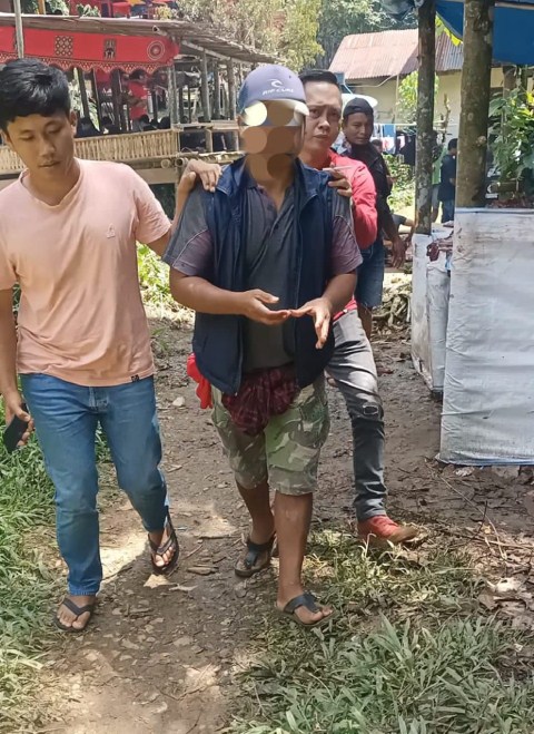 DITANGKAP -- Warga Lembang Bori Ranteletok, Kecamatan Sesean inisial YTL (37) diringkus tim Resmob Polres Toraja Utara gegara merudapaksa anak dibawa umur, Jumat (12/1) lalu. Peristiwa ini terjadi pada bulan Mei tahun lalu. 