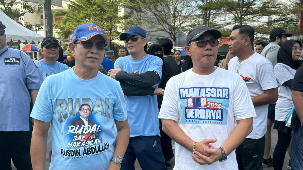 IST JALAN SEHAT-Bacawali Andi Seto Asapa melepas peserta jalan sehat di Anjungan Pantai Losari, Minggu pagi (7/7) (atas). Di hari yang sama, dua kandidat wali kota Rusdin Abdullan dan Irwan Adnan bertemu di kawasan CFD Boulevard.   