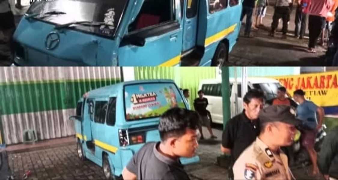 TABRAK -- Satu unit mobil angkot yang menabrak mobil parkir di Jalan Borong Raya diamankan personel Laka Polrestabes Makassar. 
